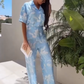🌴 Vacation haute couture! A printed shirt with wide-leg trousers for an elegant look ✨