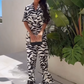 🌴 Vacation haute couture! A printed shirt with wide-leg trousers for an elegant look ✨