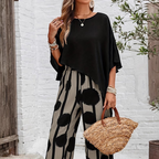 ⏰ 67% off for a limited time! 🌸 Five-quarter-sleeve top & printed trousers set