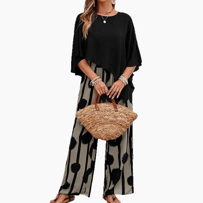 ⏰ 67% off for a limited time! 🌸 Five-quarter-sleeve top & printed trousers set