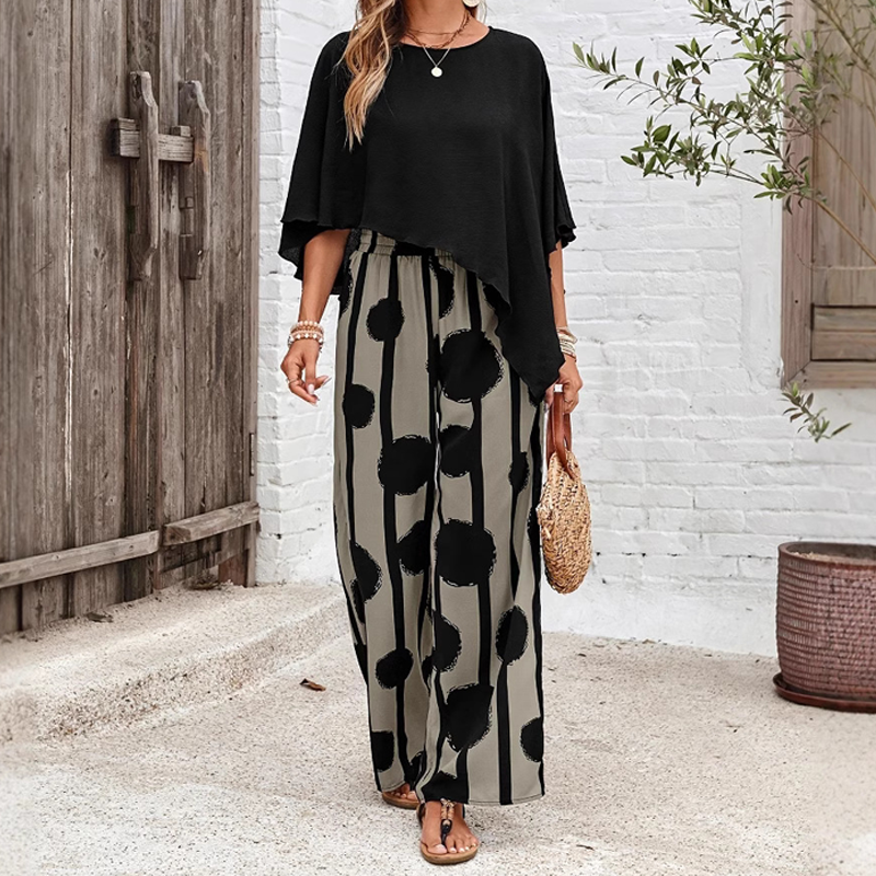 ⏰ 67% off for a limited time! 🌸 Five-quarter-sleeve top & printed trousers set